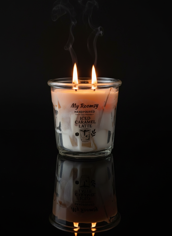 Lit Iced Caramel Latte candle with reflection and smoke