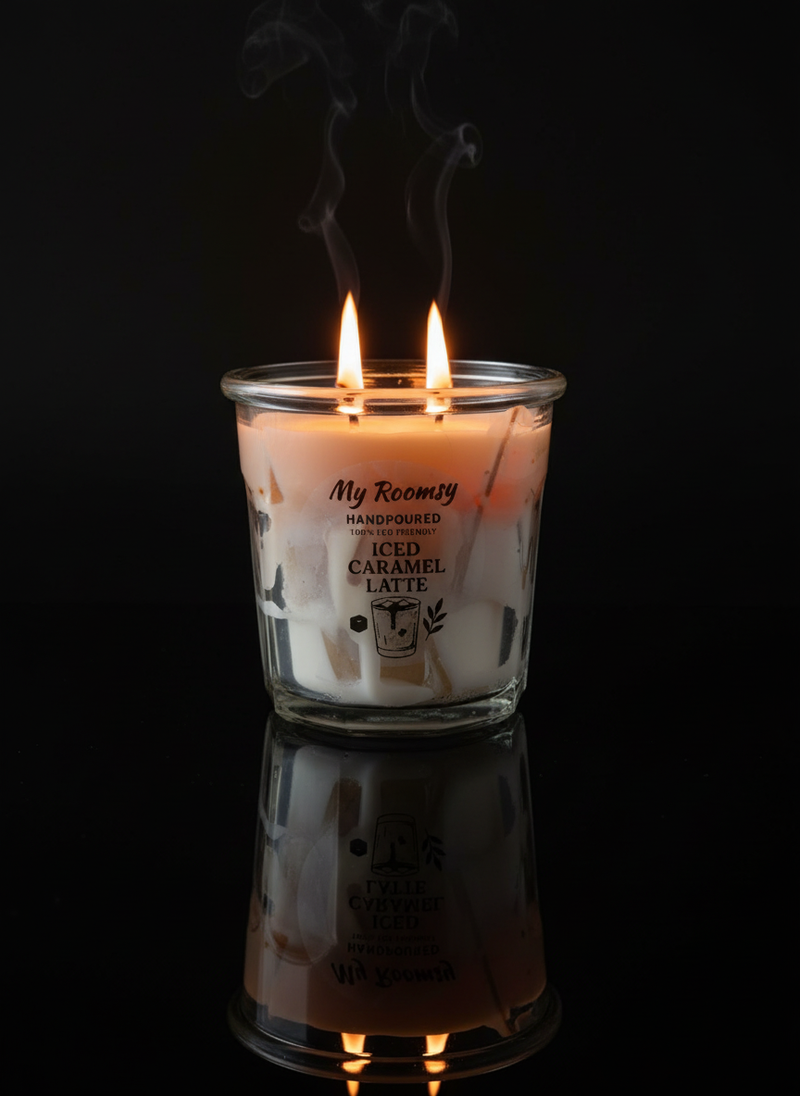 Lit Iced Caramel Latte candle with reflection and smoke
